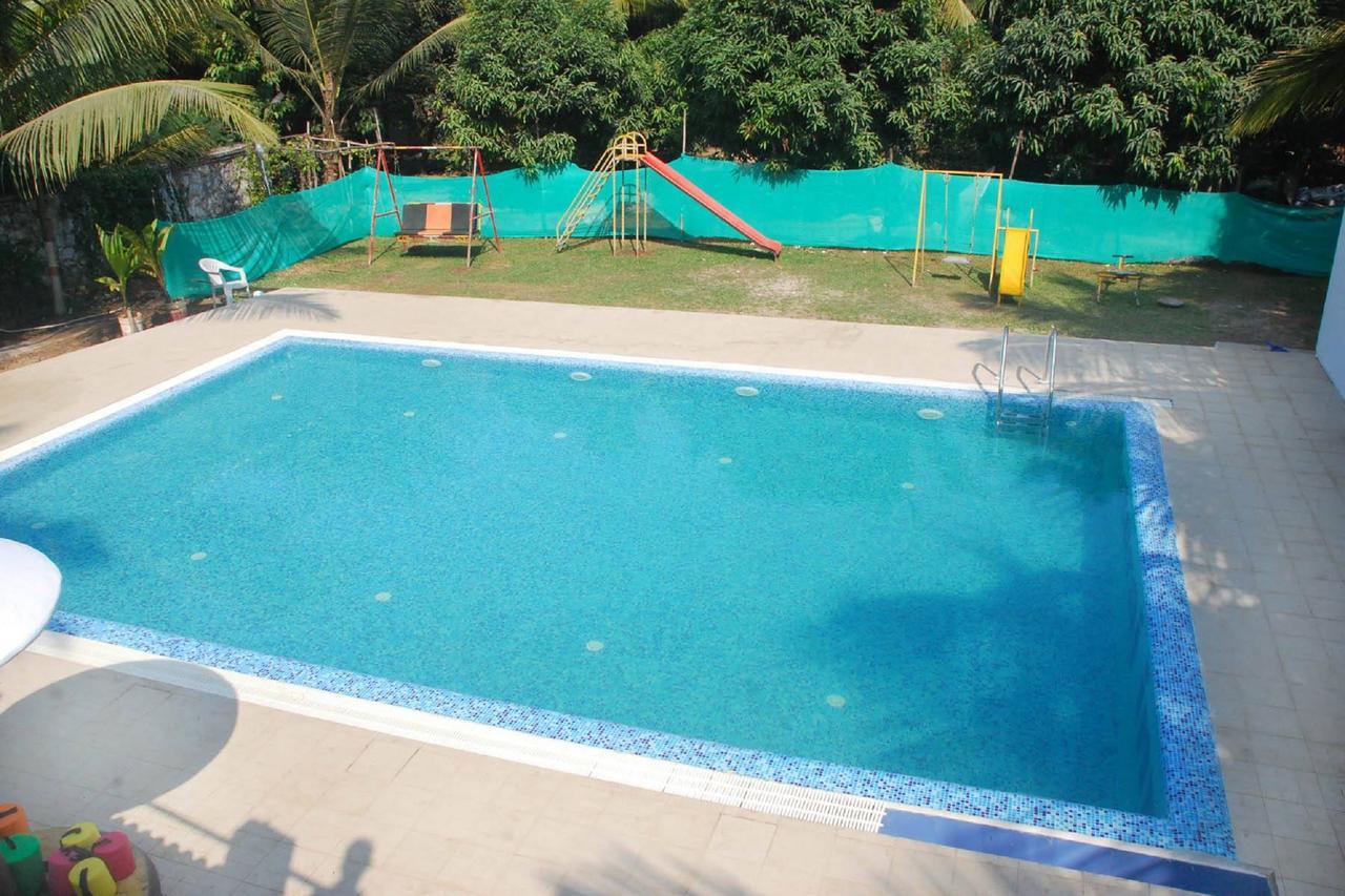 Resort Ruturaj Inn Alibag Bagian luar foto
